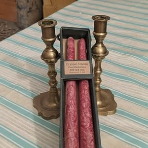 Bronze candle holders and candles